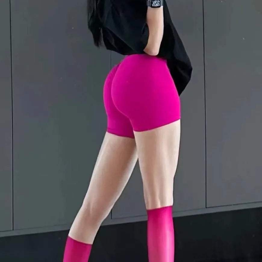 Seamless hip hugging fitness shorts, internet famous sports three part pants, high waisted and high stretch peach hip pants for